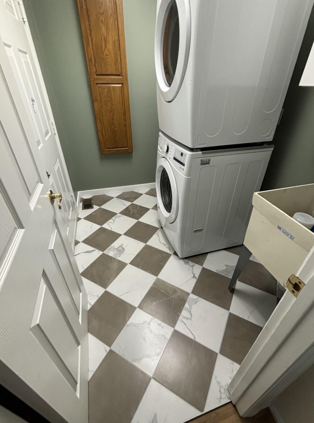 Laundry Room – Tile Flooring Completed
