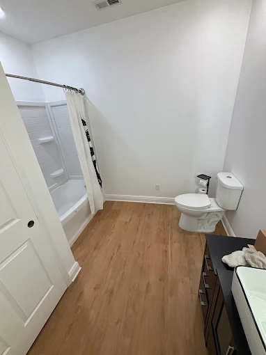 Bathroom – LVP Flooring & Trim Work